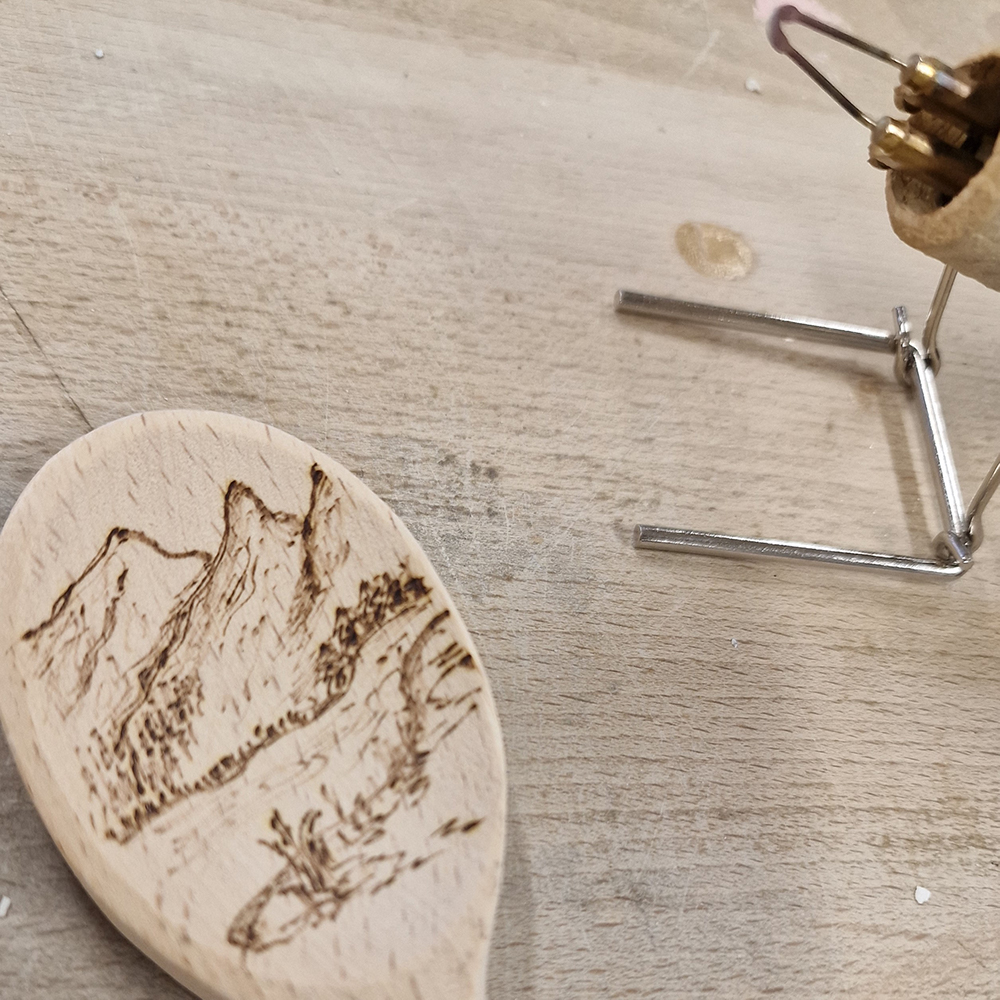 A wooden, hand-fired kitchen spoon