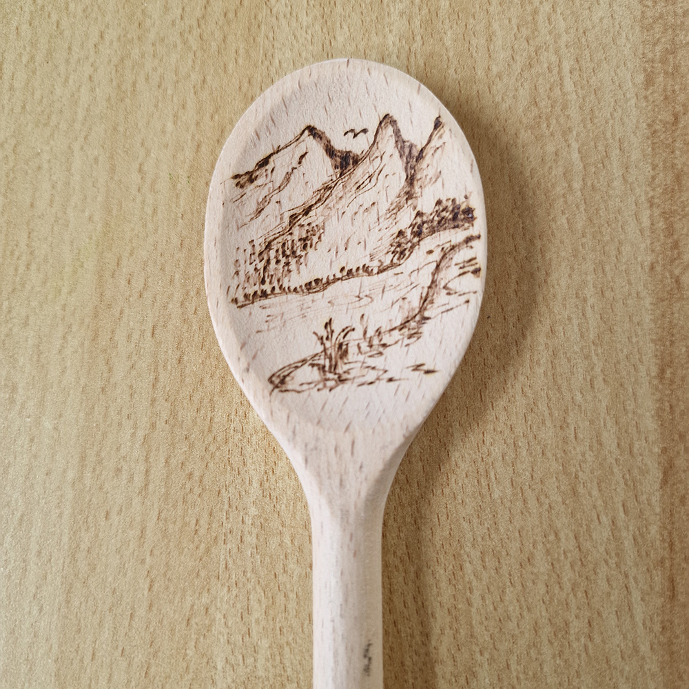 A wooden, hand-fired kitchen spoon